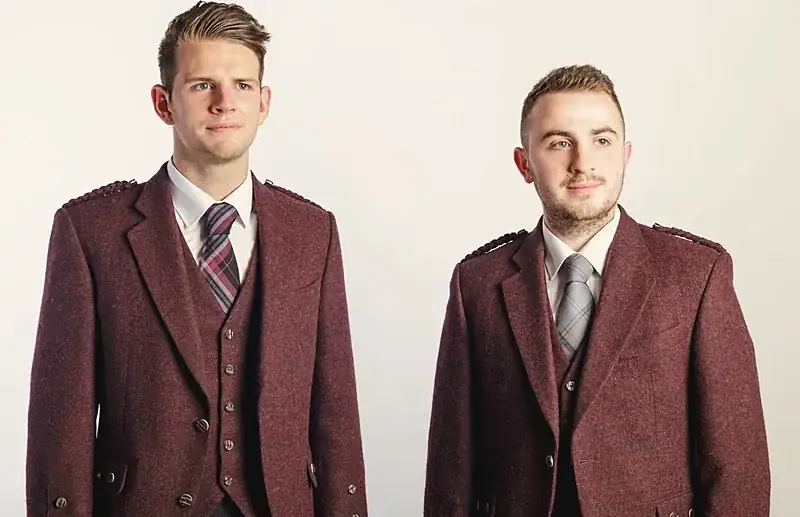 Two men in burgundy tweed jackets