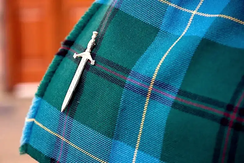 Kilt hire customers in Highland dress